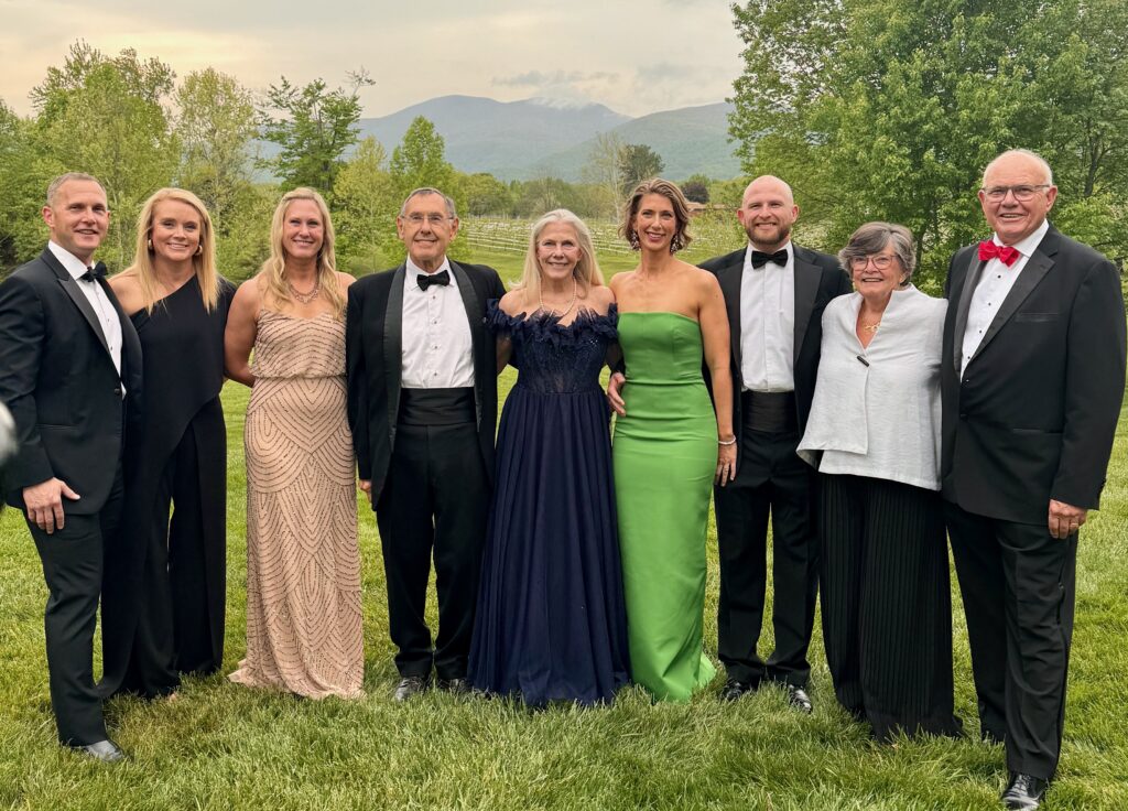 Photo of the Hodson family posing for a photo at the 25th Anniversary Gala celebration. 