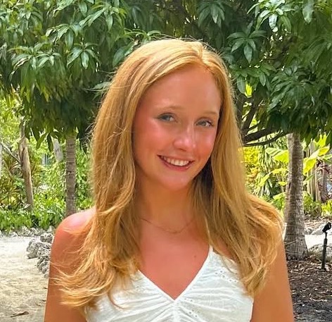 A headshot of a young female