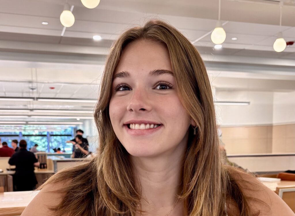 A headshot of a young female