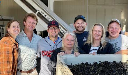 Seven Veritas harvest and cellar crew members