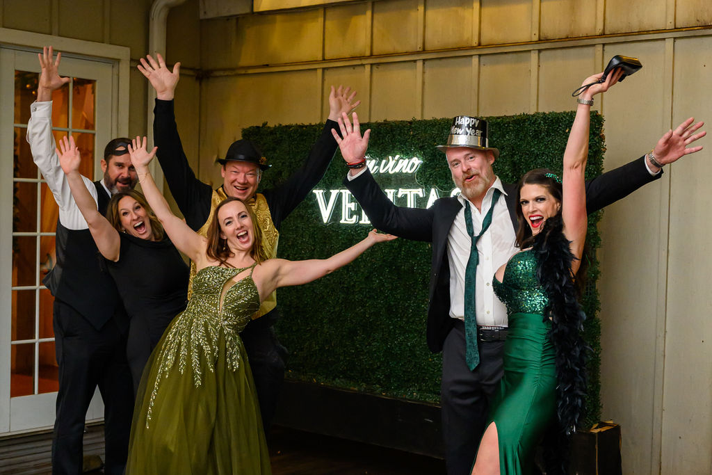 A group of friends at the Veritas NYE Masked Ball